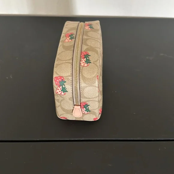 Coach light khaki multi strawberry large cosmetic bag excellent condition.
